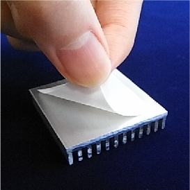 Silicone free thermal conductive sheet